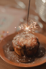 birthday cake with sparkle candle.