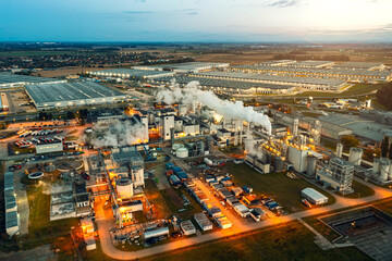 Top view at night on a large number of industrial enterprises for the refining of oil and the production of gasoline.