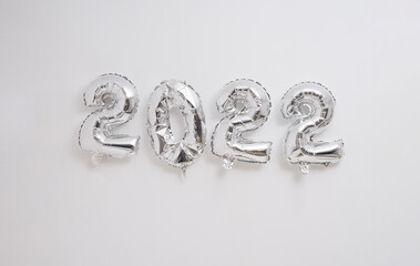 2022 silver ballos levitating on white background happy new year