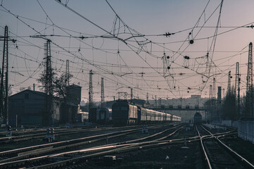 Obraz na płótnie Canvas Foggy cold morning at the train station