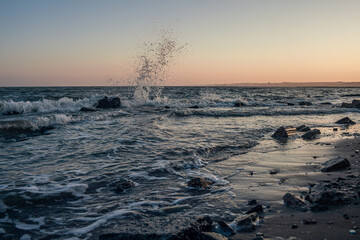 Waves and stones by the sea