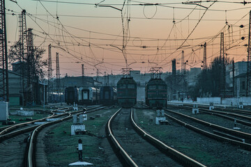 Fototapeta na wymiar Pastel sky over the old train station
