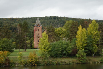 Fototapeta na wymiar Old castle in a park at a river, Mettlach, Saarland, Germany 