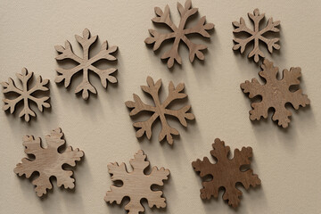 christmas themed background with snowflakes made of wood