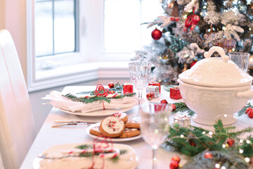 Table set for festive Christmas holiday dinner celebration