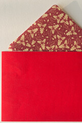 red paper with decorative envelope flap