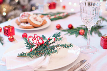 Table set for festive Christmas holiday dinner celebration