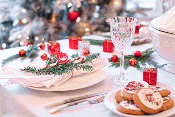 Obraz na płótnie Canvas Table set for festive Christmas holiday dinner celebration