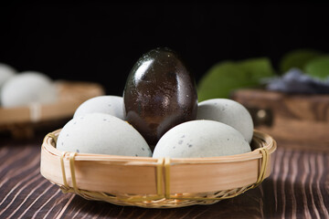 preserved duck eggs or Century egg on wood background