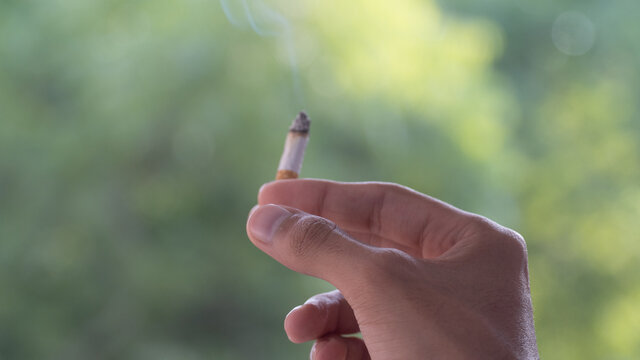 Young boy inhaling Cigratte, Smokers, Smoking cigratte and Drug Addicted people