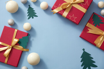 Light blue background with christmas ornament , pine tree twinkle pearl and red gift box with yelllow ribbon , blank space for merry christmas holiday advertising 