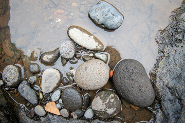 Rocks in the river, stone background