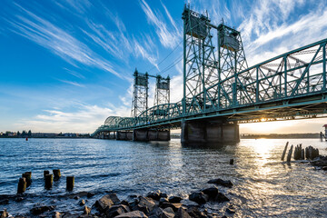 Interstate Columbia River Bridge with lifting section ant counterweight towers at twilight