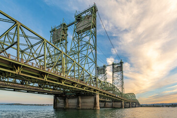 Long sectional arched transportation Interstate Columbia River Lift Bridge against cloudy sky
