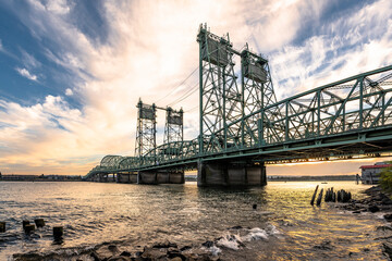 Transport highway drawbridge across the Columbia River against the backdrop of an evening cloudy sky
