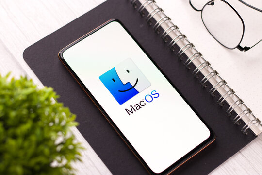 West Bangal, India - November 11, 2021 : MacOS logo on phone screen stock image.