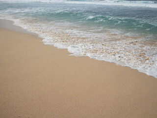 Fototapeta na wymiar Ocean wave in the summer beach