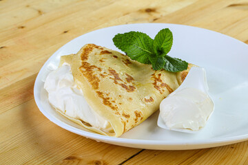 Tasty Pancake with sour cream