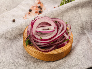 Sliced red onion rings in the bowl