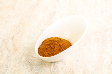 Dry Paprika powder in the bowl