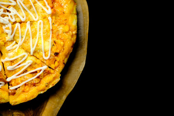 Closeup of homemade pizza slice, copy space