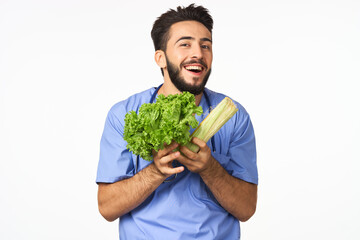Cheerful dietitian with vegetables in hands vitamins healthy food