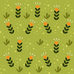 Autumn leaves background on green background