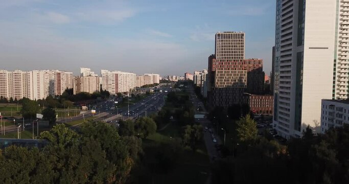 4K late afternoon summer aerial video of newly built modern highrise Moscow apartment buildings block complex in Kuntsevo district near Molodeznaya subway station and Rublevskoye highway in Russia