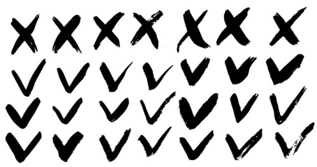 Tick and cross signs. Hand drawn, vector, isolated. Brush strokes