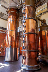 Copper distillation cube. Technological line for distillation of cognac. - obrazy, fototapety, plakaty