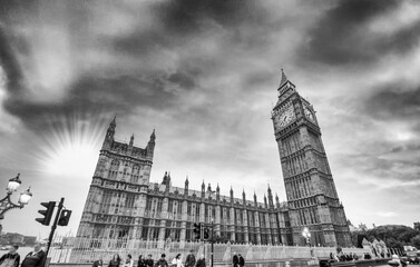 Fototapeta na wymiar London. Palace of Westminster and people walking on the bridge