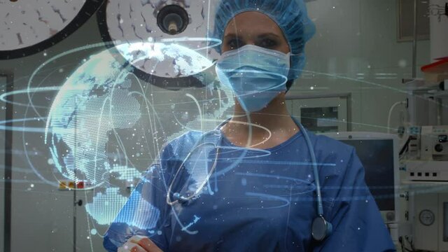 Animation of globe with network of connections over female surgeon in operating theatre