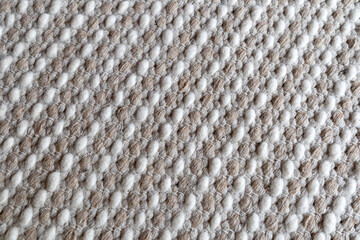Textured beige wool rug