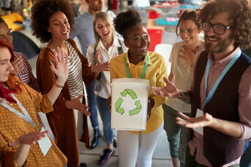 Group of young employees recycling