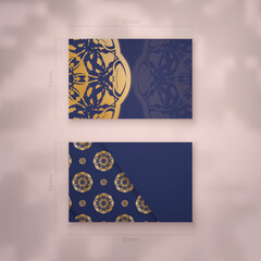 Business card in dark blue with vintage gold pattern for your business.