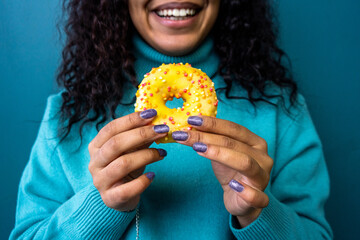 Young  woman with doughnut