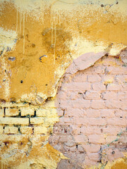 Grunge texture of old brick wall and plaster