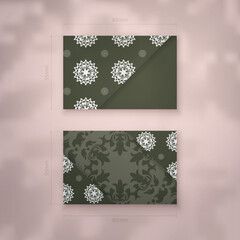 Dark green business card with Greek white pattern for your personality.