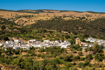 Fototapeta na wymiar Scenic view of Juviles village and its beautiful white houses, Las Alpujarras, Sierra Nevada National Park, Andalusia, Spain