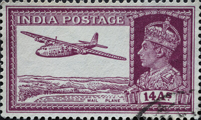 India - circa 1937: a postage stamp from India showing the Armstrong Whitworth Ensign 1 Mail Plane....
