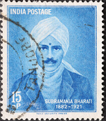 India - circa 1960: a postage stamp from India showing the portrait of Subramania Bharati...