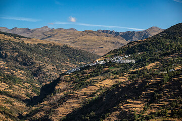 Scenic view of the beautiful Poqueira valley, with the village of Capileira in the distance, Las Alpujarras, Sierra Nevada National Park, Andalusia, Spain