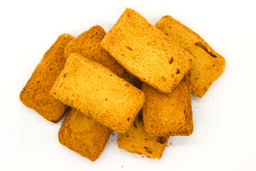 Crispy rusk on white background with selective focus