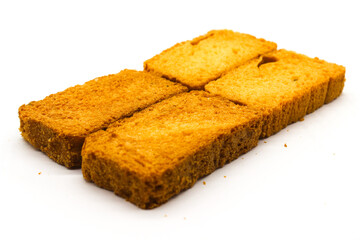 Crispy rusk on white background with selective focus