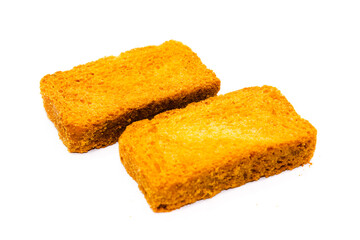Crispy rusk on white background with selective focus