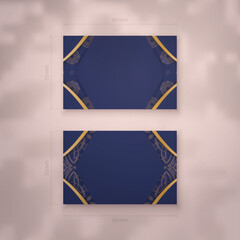 Presentable dark blue business card with vintage gold pattern for your brand.