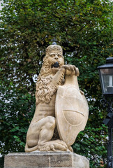 Medieval stone statue of a heraldic lion