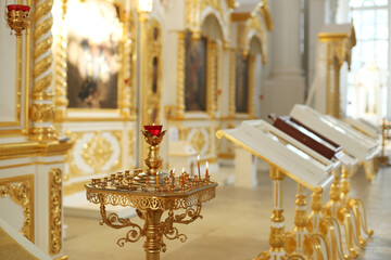 candles burning in the church at the morning service
