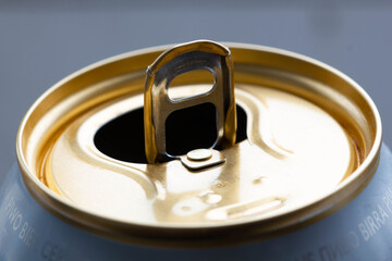 Aluminum tin can for drink. Tin Copper Can for beer. Jar for fizzy water. Capacity for carbonated fruit water. Soda in a container. Close-up