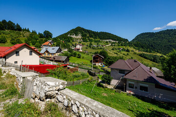 Fototapeta na wymiar Village and Houses in the carpathian of Romania